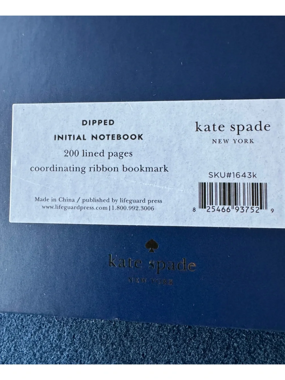 kate spade ♠️ cream, and purple lined Notebook with coordinating ribbon marker